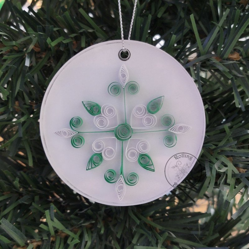 Quilled green and white star Christmas tree ornament on a three inch clear acrylic disk by Rolling Blossoms Quilled green and white star Christmas tree ornament on a three inch clear acrylic disk by Rolling Blossoms