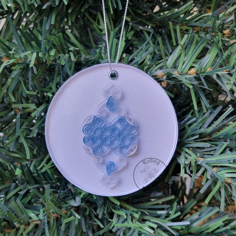 Quilled blue and white old fashioned Christmas tree ornament on a three inch clear acrylic disk by Rolling Blossoms Quilled blue and white old fashioned Christmas tree ornament on a three inch clear acrylic disk by Rolling Blossoms