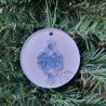 Quilled blue and white old fashioned Christmas tree ornament on a three inch clear acrylic disk by Rolling Blossoms