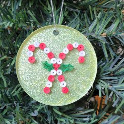 Quilled candy canes Christmas tree ornament on a three inch clear acrylic disk by Rolling Blossoms