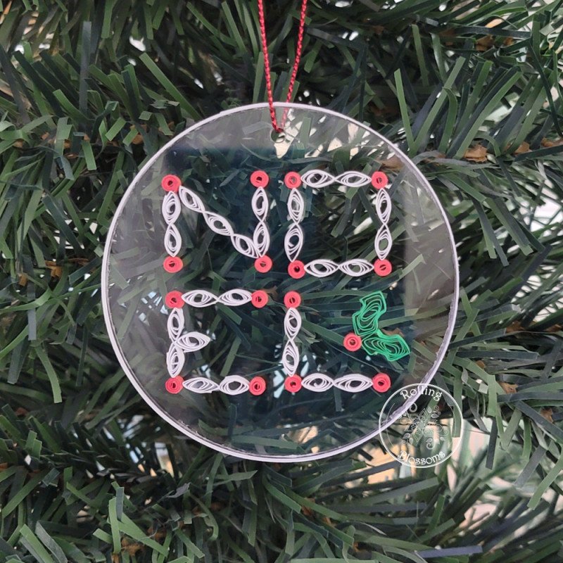 Quilled Noel Christmas tree ornament on a three inch clear acrylic disk by Rolling Blossoms Quilled Noel Christmas tree ornament on a three inch clear acrylic disk by Rolling Blossoms