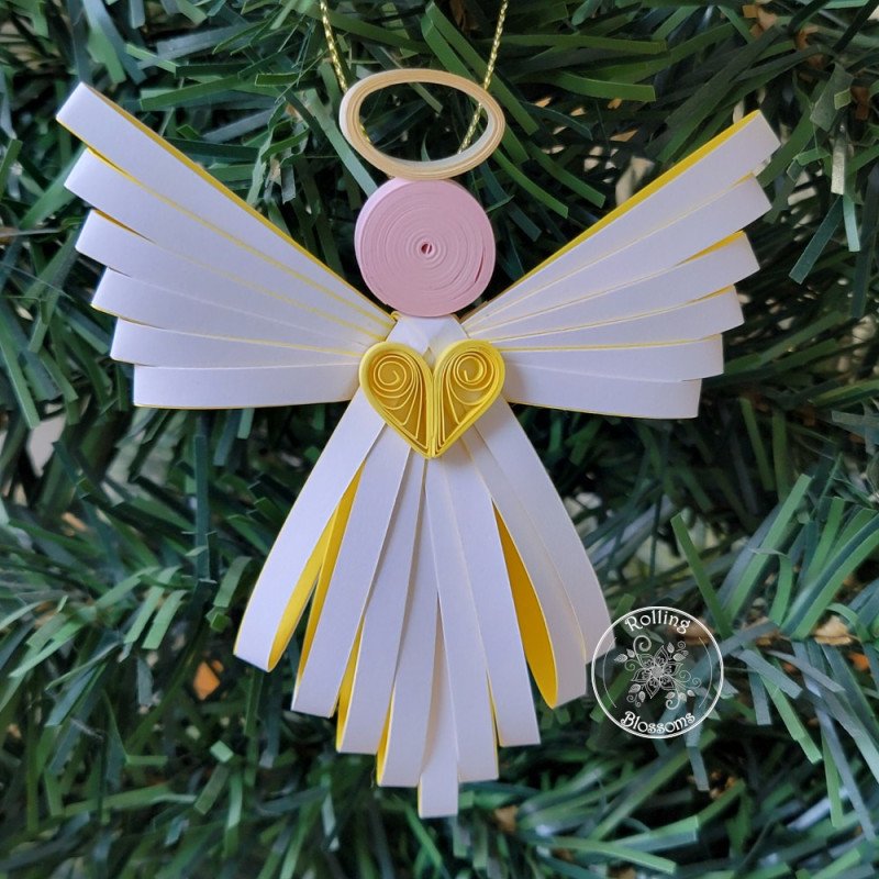 Yellow quilled angel Christmas ornament by Rolling Blossoms Yellow quilled angel Christmas ornament by Rolling Blossoms
