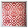Red and white woven paper snowflake design in white hanging frame by rolling blossoms