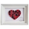 Quilled red heart valentine filled with spiral designs by Rolling Blossoms