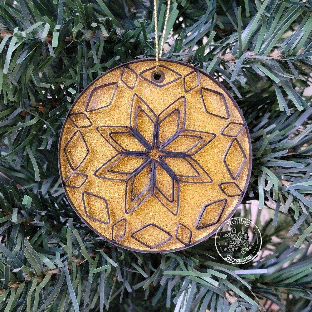 Quilled black and gold snowflake ornament