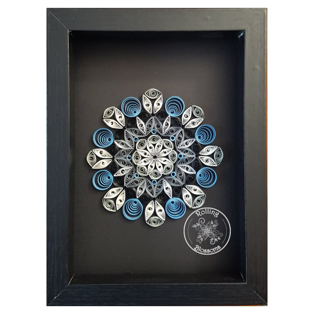 Small quilled black and white mandala